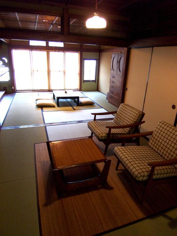 Hotel Itsumoya Hatsukaichi Habitación foto